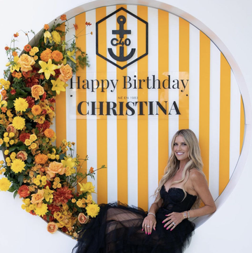 christina hall at her birthday in a black dress