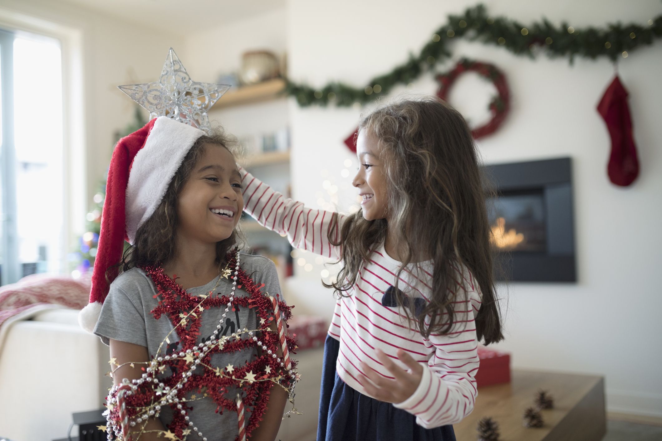 Cute Happy Little Boy and Girl Making Snowman on Christmas Holiday