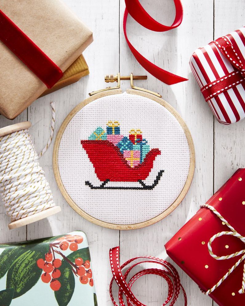 cross stitch presents in sled