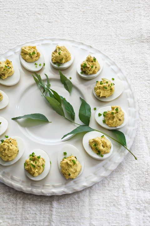 deviled eggs with cilantro, jalapeños, and curry