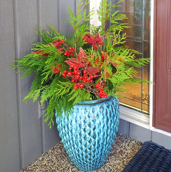 14 Holiday Planter Ideas That Will Give Guests a Warm Welcome