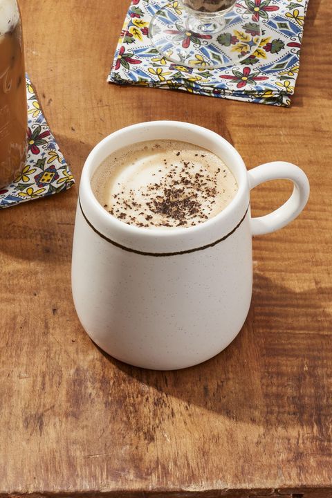 cowboy coffee in white mug on wood background