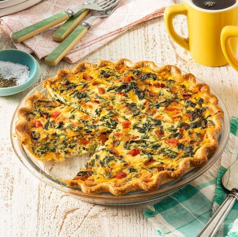spinach quiche with yellow coffee mug
