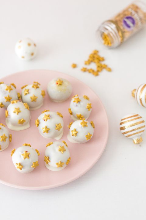 gold star cake pops with gold and white ornaments