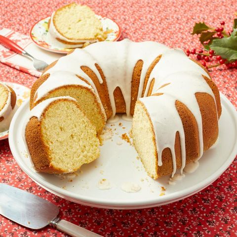 christmas cake recipes ideas eggnog cake on white plate red background