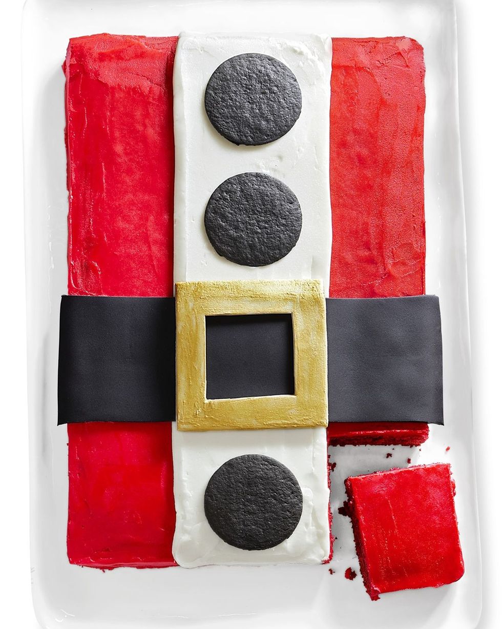 rectangle sheet cake decorated like santas red coat with a black belt gold buckle and cookies for buttons
