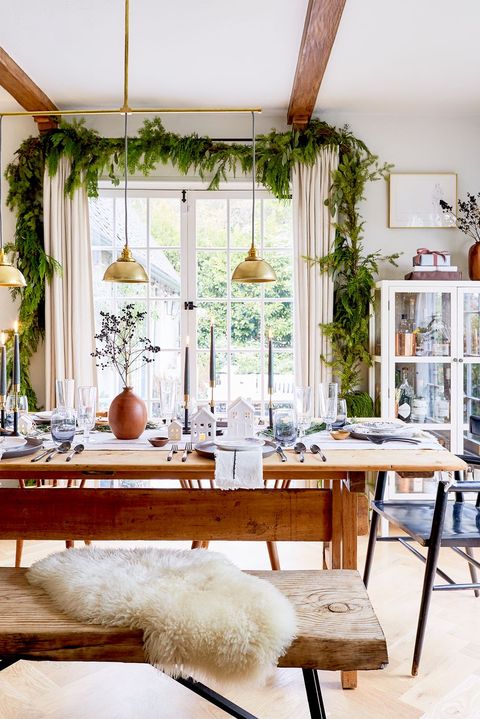 rustic and contemporary dining room decorated for winter holidays