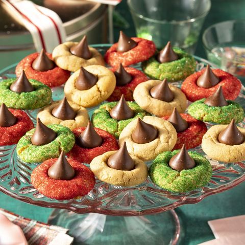 peanut butter blossoms in red and green on cake stand