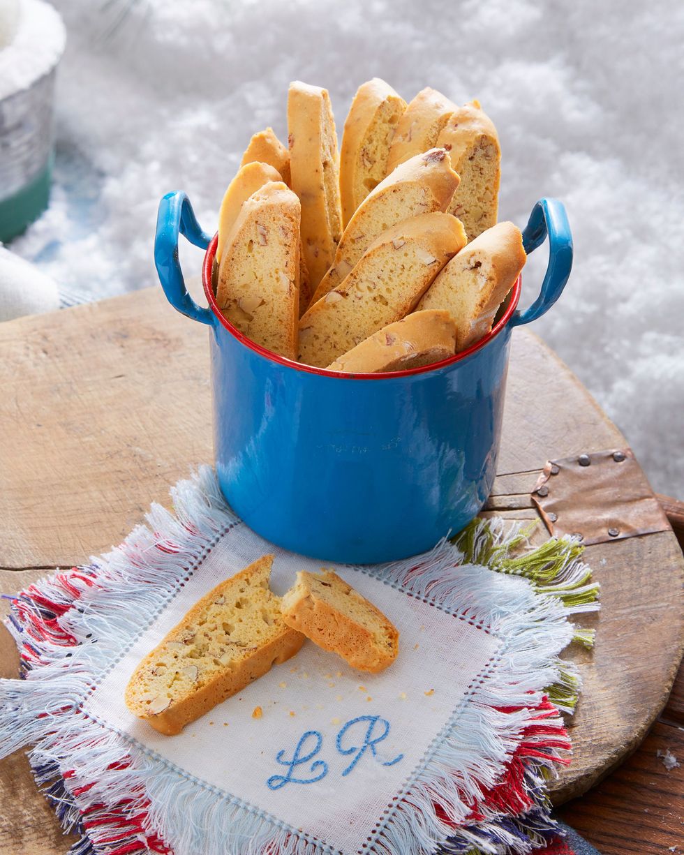 almond biscotti in a blue container