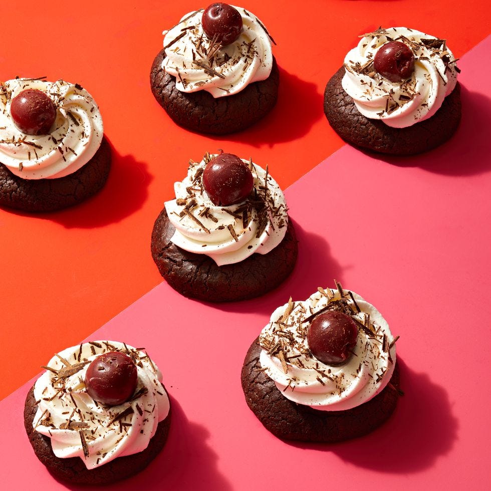 black forest cookies with chocolate shavings and cherry on top