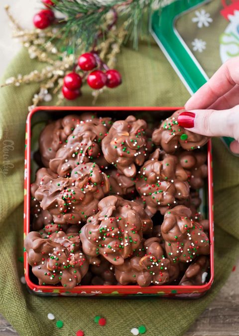 easy christmas crockpot candy in red square tin with sprinkles
