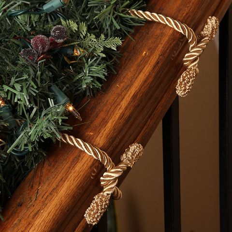 christmas decoration hanging hacks decorative garland ties on banister