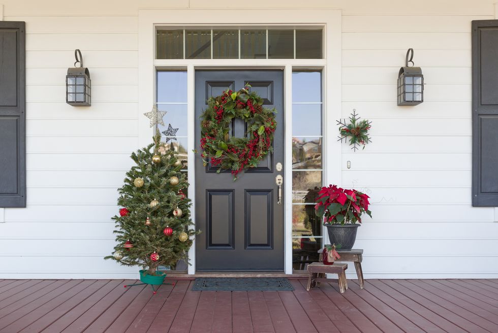 christmas decorations at front door of house