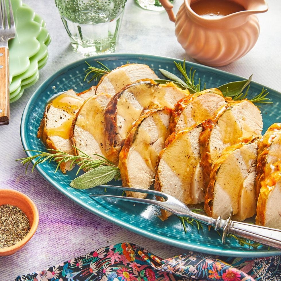 air fryer turkey breast sliced on blue platter