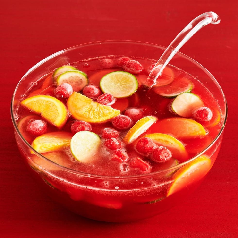 cherry punch in bowl on red surface