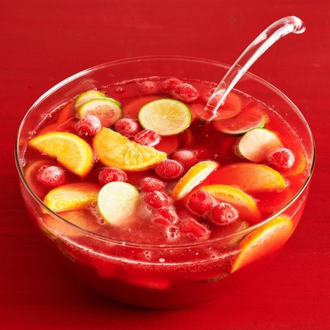 cherry punch in bowl on red surface