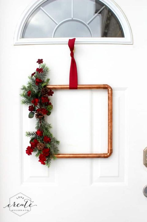 christmas door decorations, square shaped copper pipe wreath on the front door