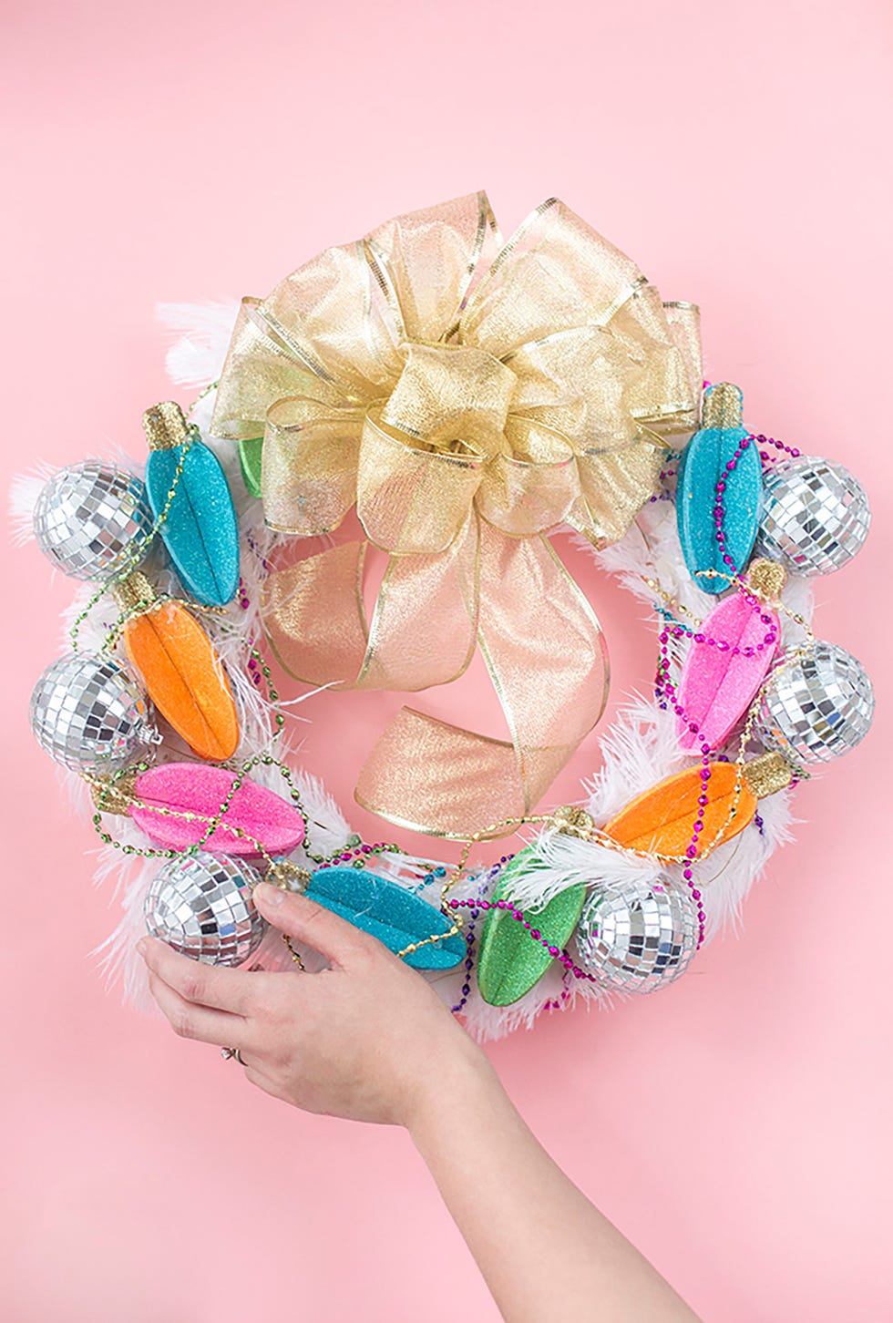 christmas door decorations, midcentury wreath with disco balls and bright ornaments