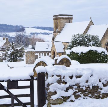 winter snow in the cotswold village of snowshill, gloucestershire, uk
