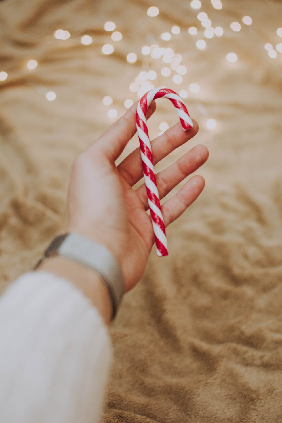 adult holiday party games featuring peppermint sticks