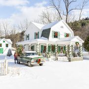 farmhouse project exterior in update new york white farmhouse with vintage truck, snow and christmas decorations