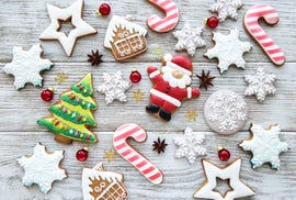 decorated christmas cookies on a wooden table