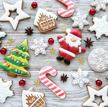 decorated christmas cookies on a wooden table