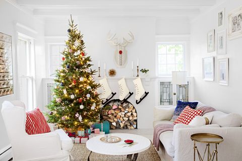christmas living room stacked wood all white