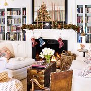 living room with fireplace decorated for christmas