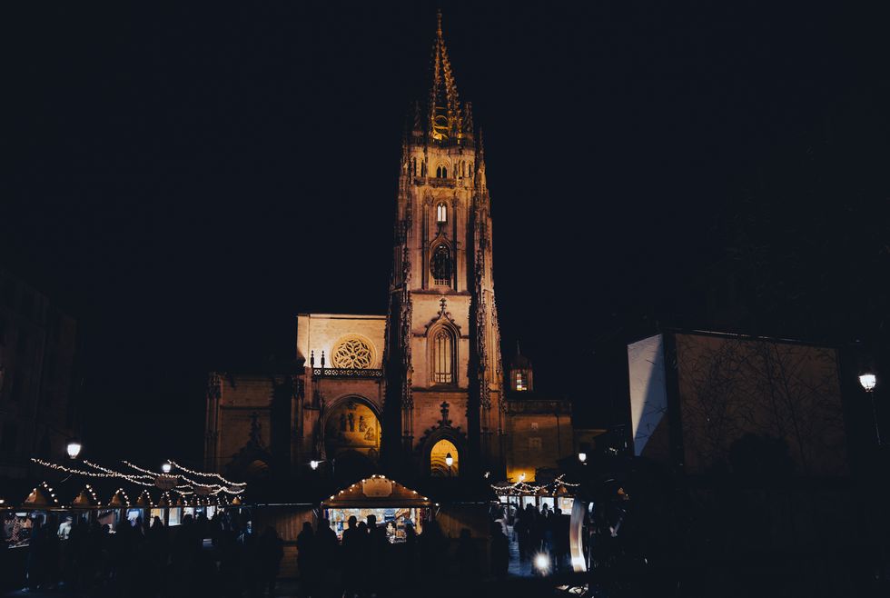 christmas market and oviedo cathedral at night