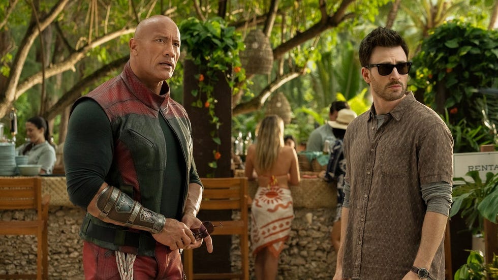the rock stands on a beach in a scene from red one