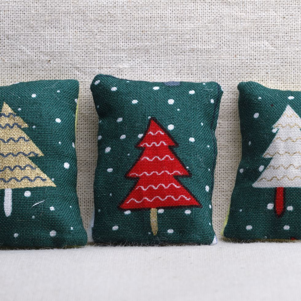 christmas party, three green pillow with christmas tree decoration