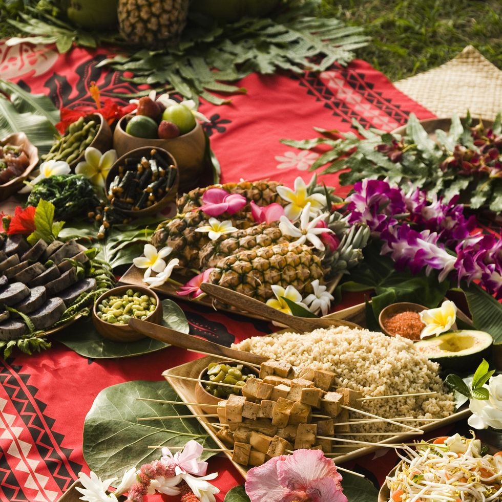 christmas party, a blanket is full of luau food for guests