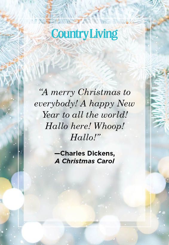 charles dickens quote from a christmas carol on close up photo of fir tree branches with christmas lights