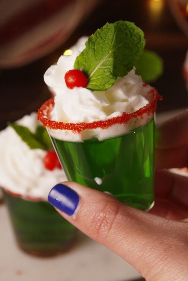 mistletoe shots with whipped cream and mint