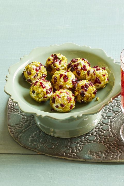 festive goat cheese balls on cake stand