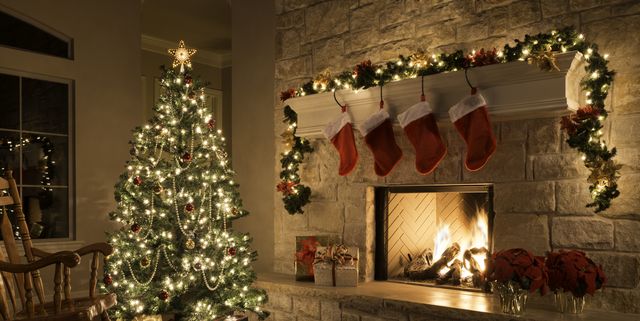 https://hips.hearstapps.com/hmg-prod/images/christmas-stockings-fireplace-tree-and-decorations-royalty-free-image-1572374566.jpg?crop=1.00xw:0.751xh;0,0.0671xh&resize=640:*