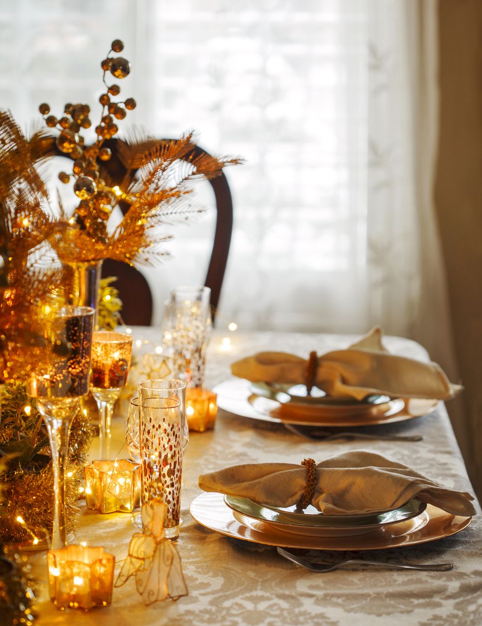 christmas table setting in golden color