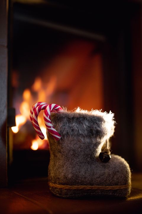 christmas traditions around world boots by the fire