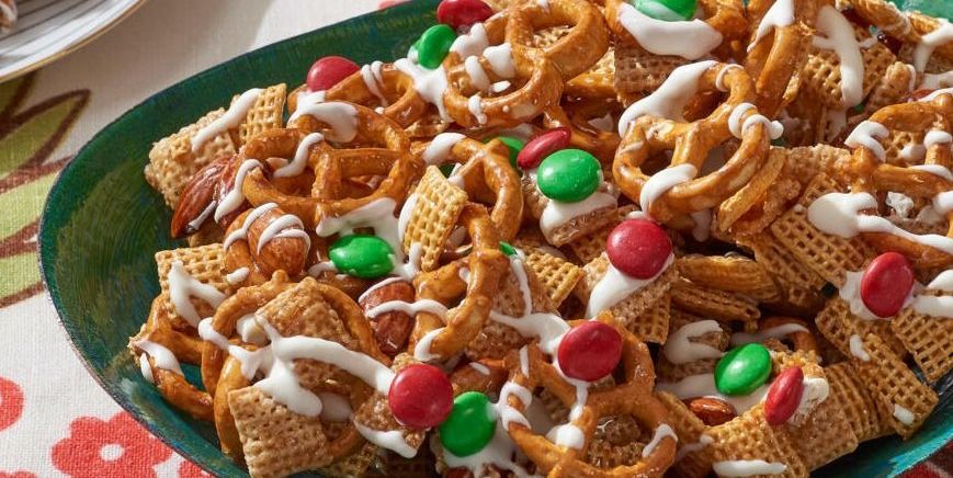 christmas treat chex mix with red and green candies