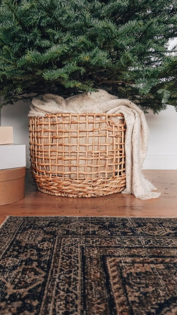 styling a christmas tree in a basket