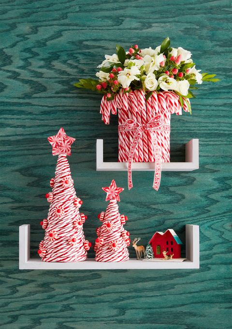 mini christmas trees made of red and white candy cane stripes