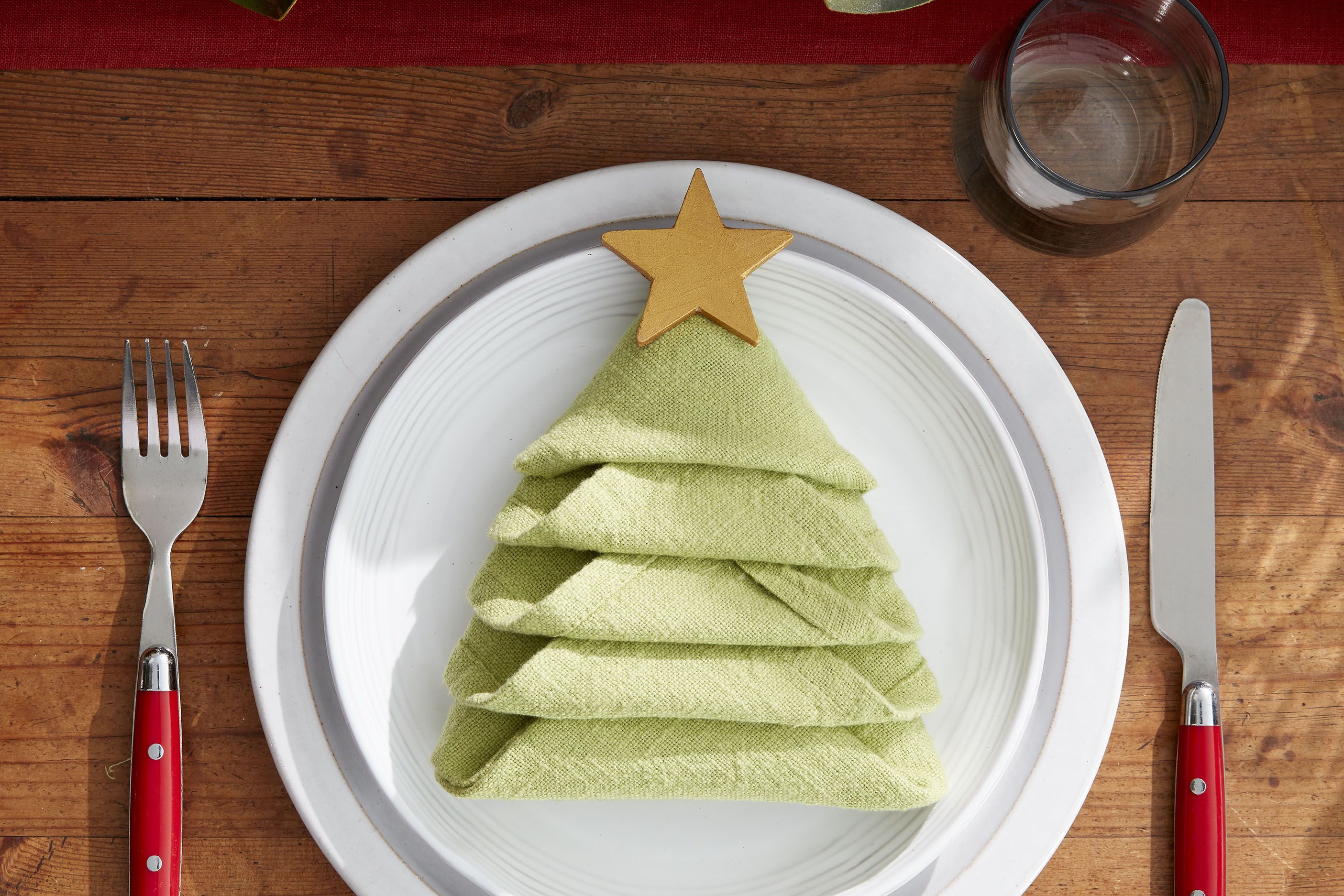 How to Make a Christmas Tree Napkin Fold - All the Steps to Folding a Napkin Into a DIY Christmas Tree