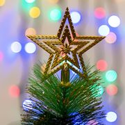 christmas tree star with christmas light background