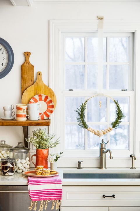 window in kitchen decorated for holidays
