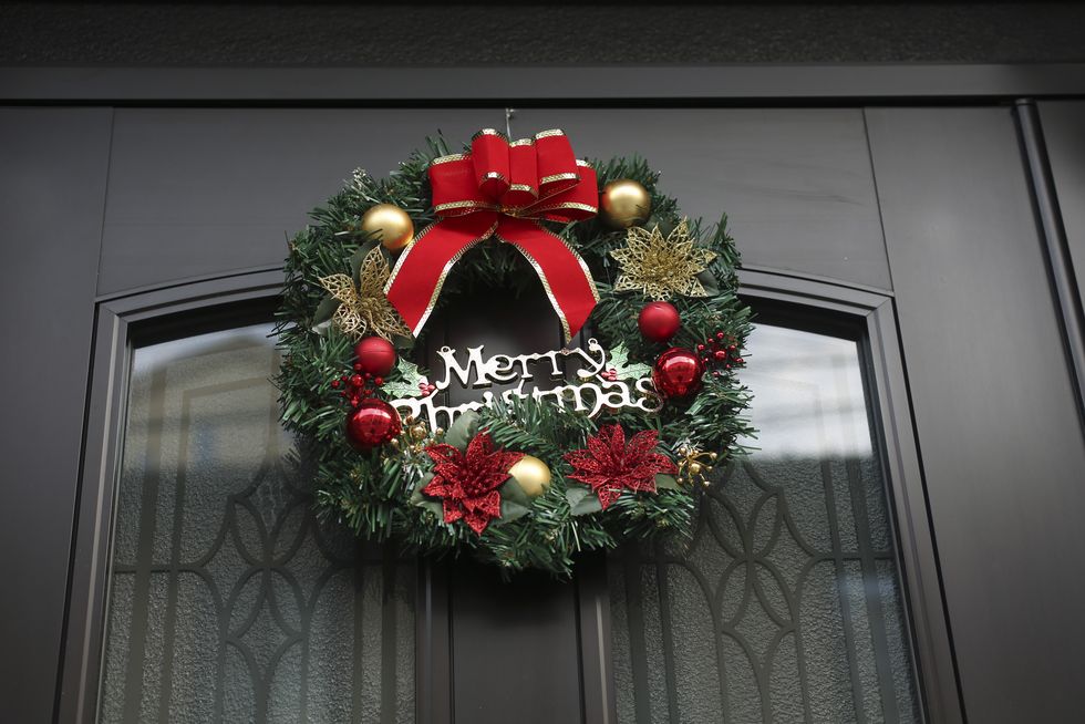 christmas wreath hanging on the door