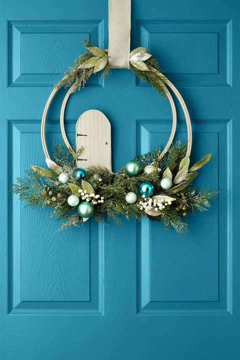 diy christmas wreaths, hooped wreath featuring a small door, evergreens and blue and green ornaments