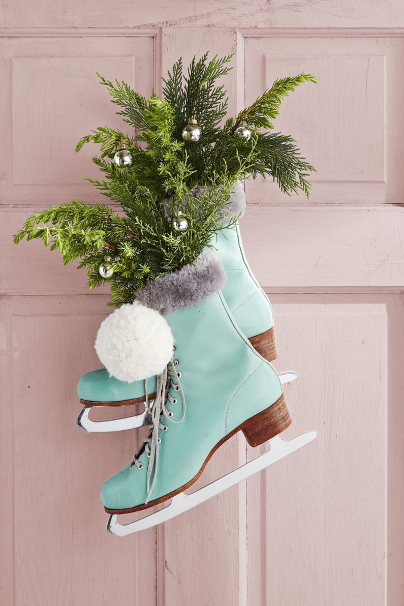 diy christmas wreaths, ice skates hanging on a door to use as a wreath
