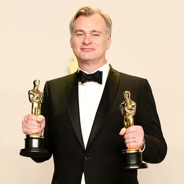 christopher nolan with his oscar awards for best director and best picture for oppenheimer