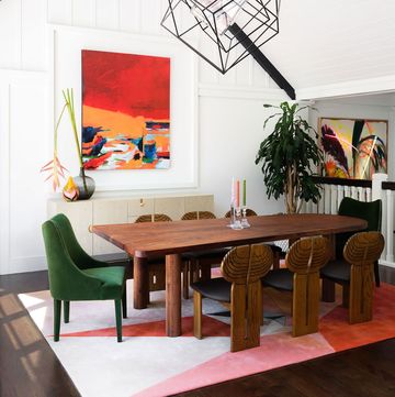 dining table with colorful rug